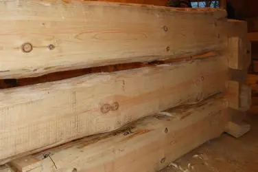 A pile of wood that is stacked on top of each other.